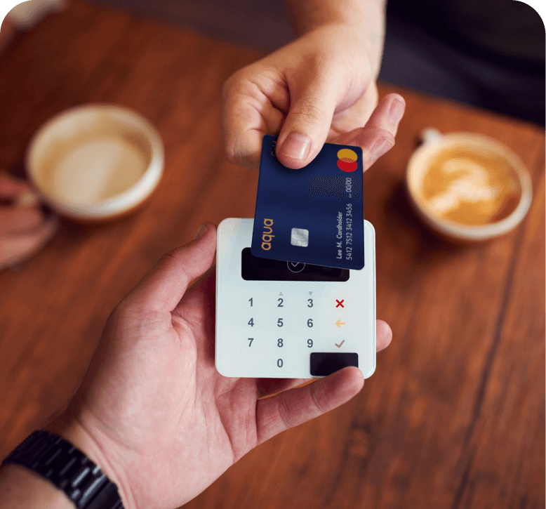 Aqua card making a contactless purchase for two coffees